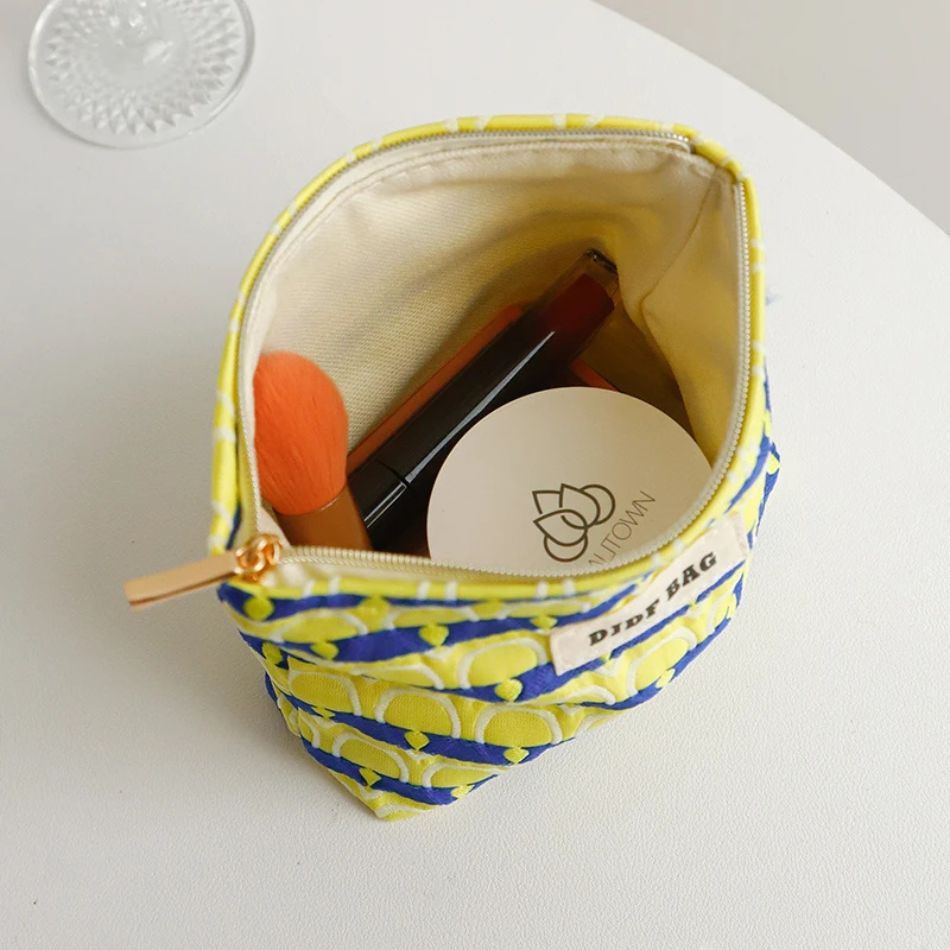 petite trousse cosmétique plumes colorées