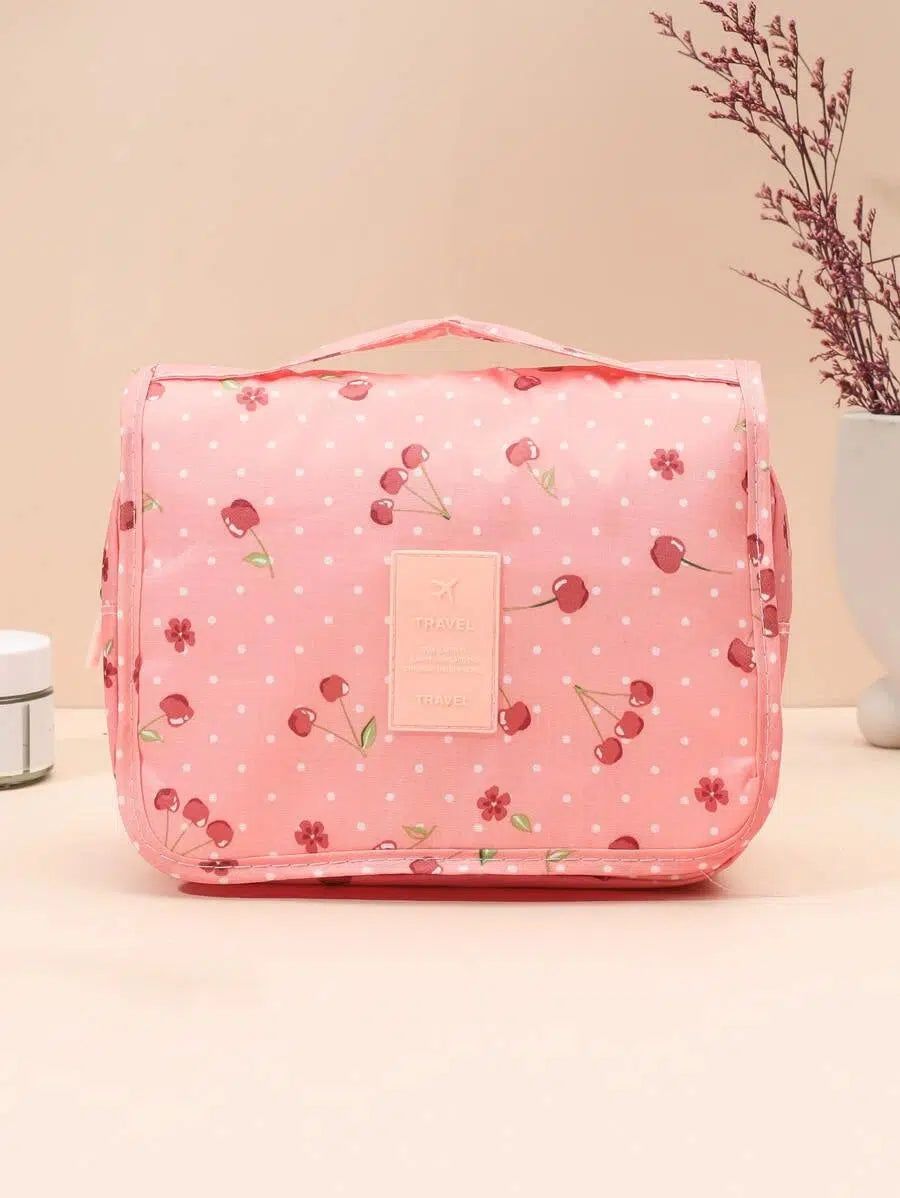 organisateur de voyage rose à motifs cerises