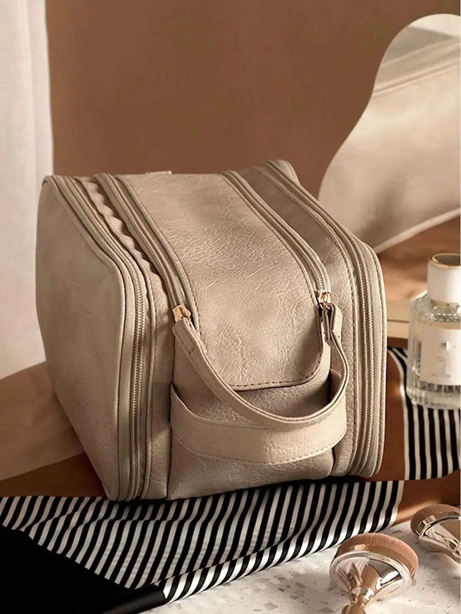trousse de voyage femme en cuir beige