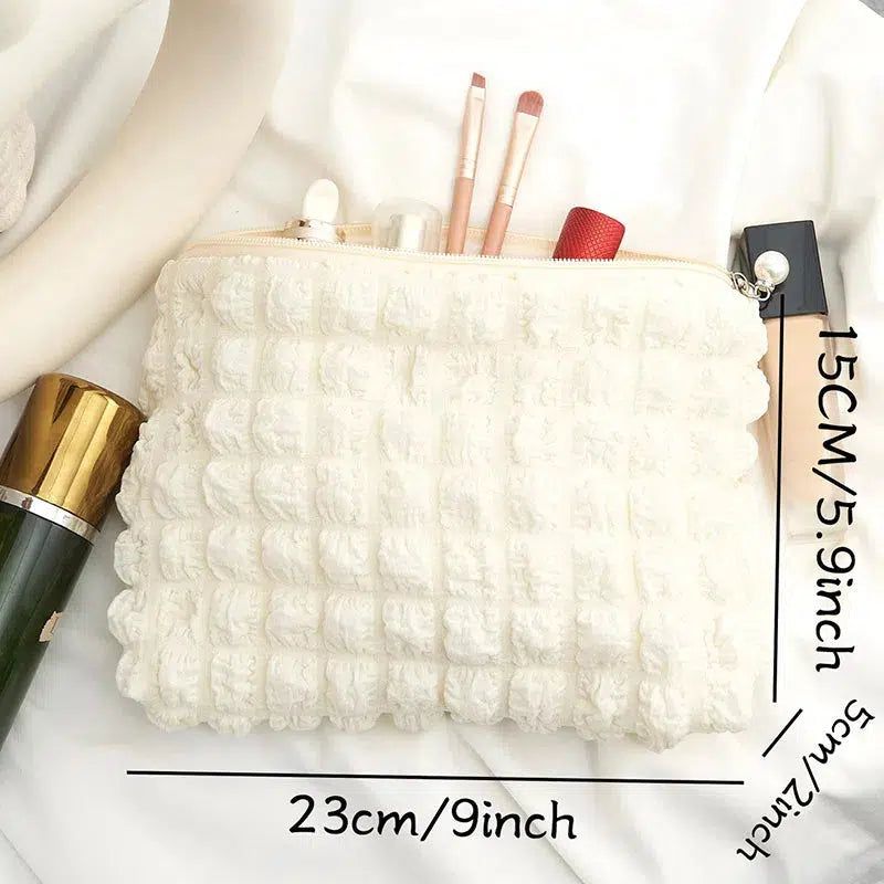 trousse de maquillage femme beige matelassée