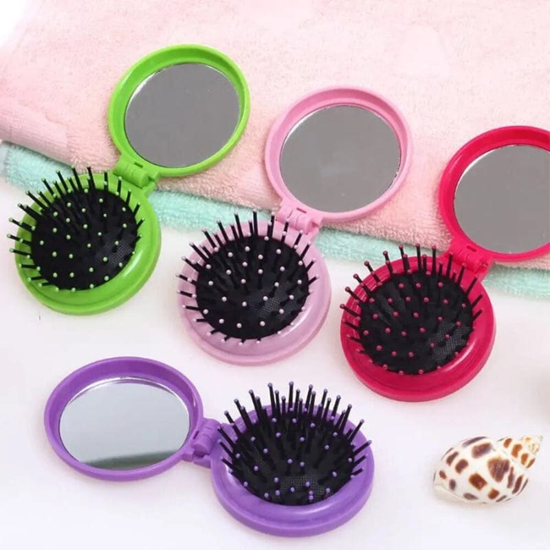 miroir de poche avec brosse intégrée