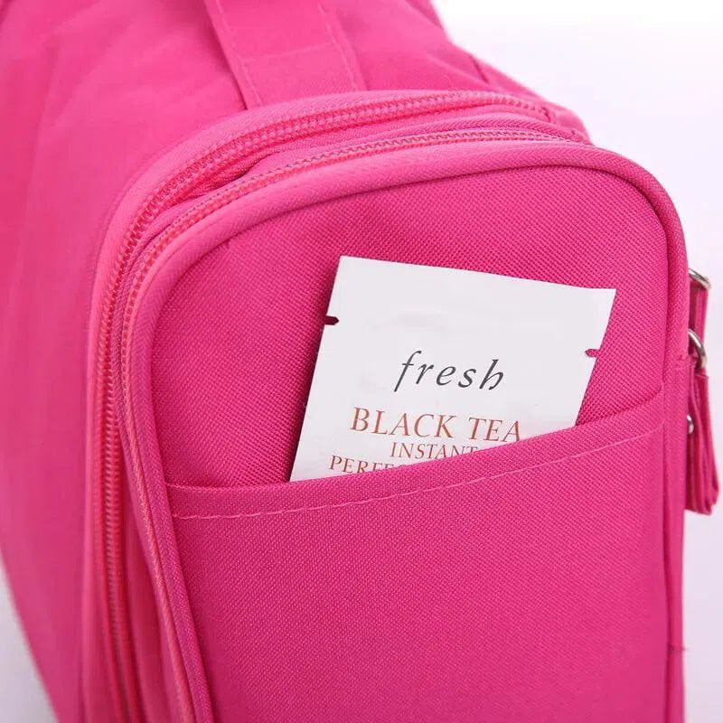 accessoire de voyage femme trousse rose