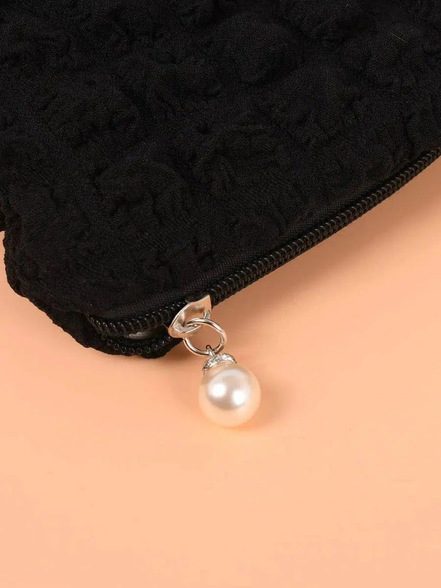 accessoire de voyage femme trousse noire