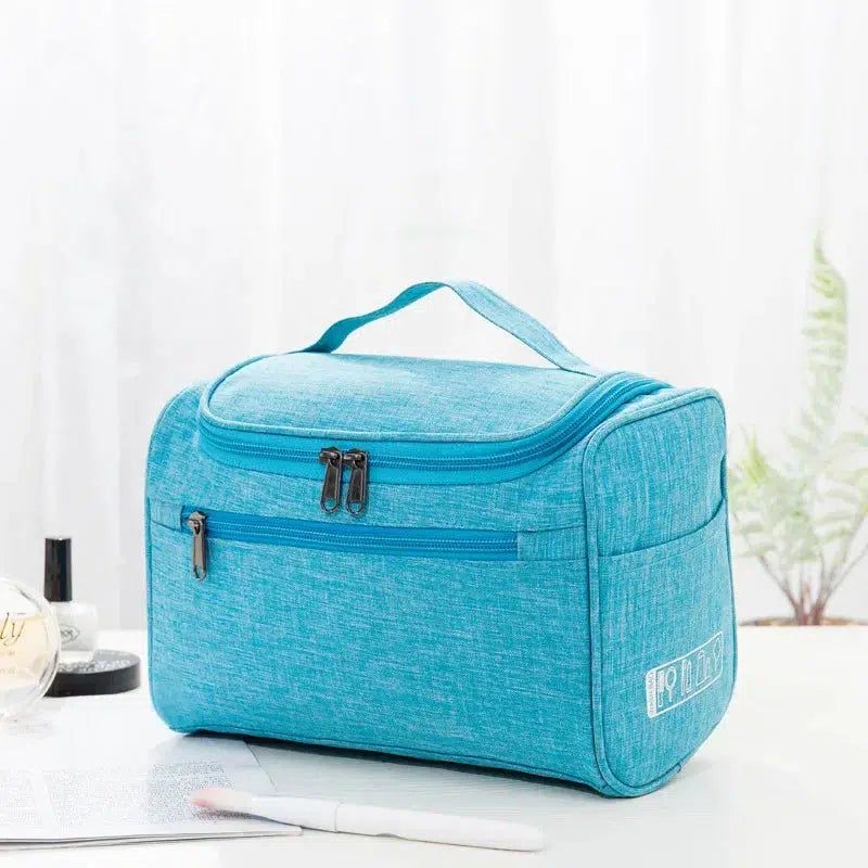 accessoire de voyage trousse de toilette bleu