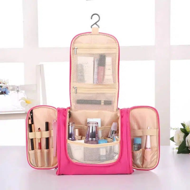 organisateur de voyage rose pour cosmétiques