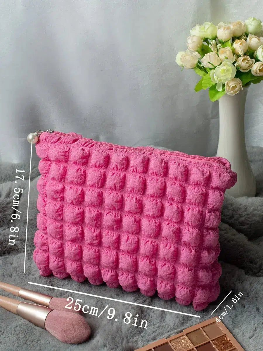 trousse de toilette matelassée rose pour femme