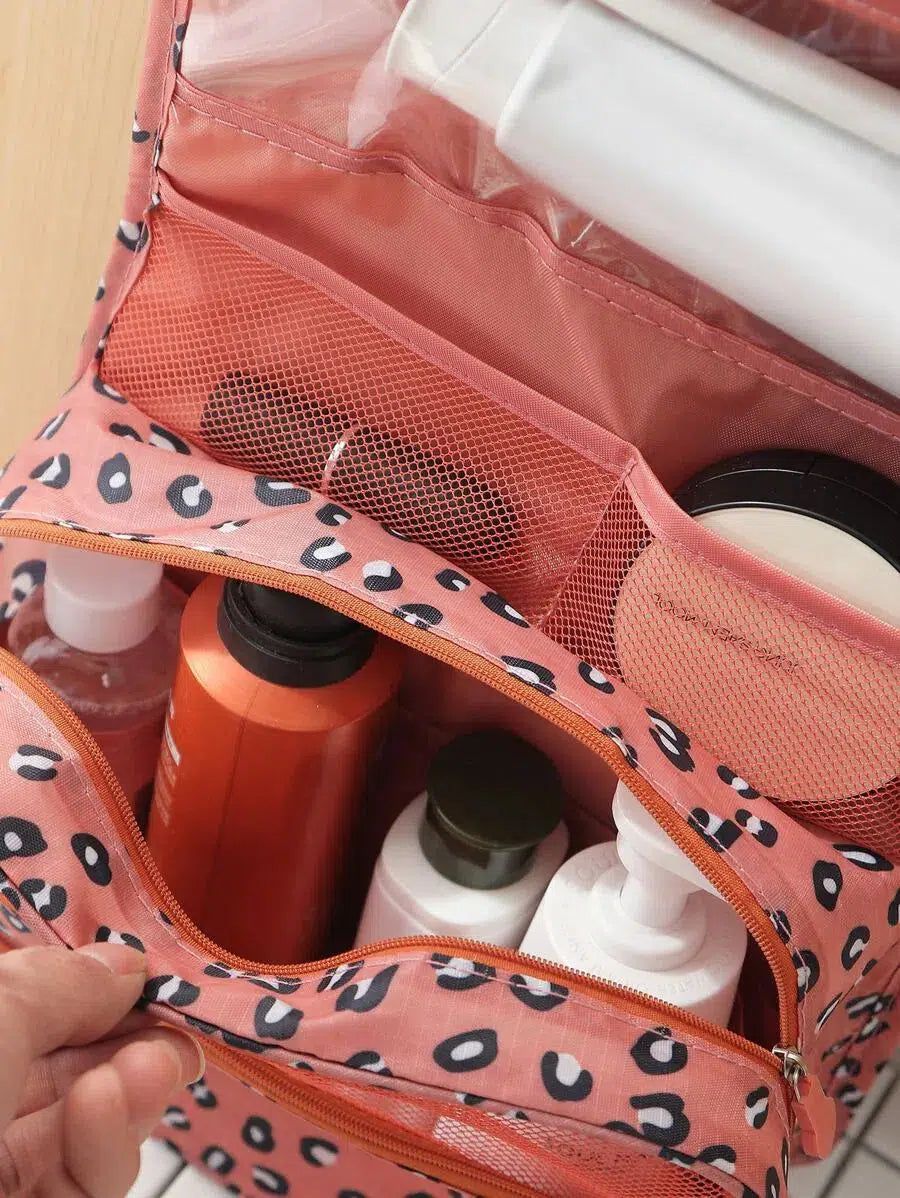 trousse de voyage rose motif léopard