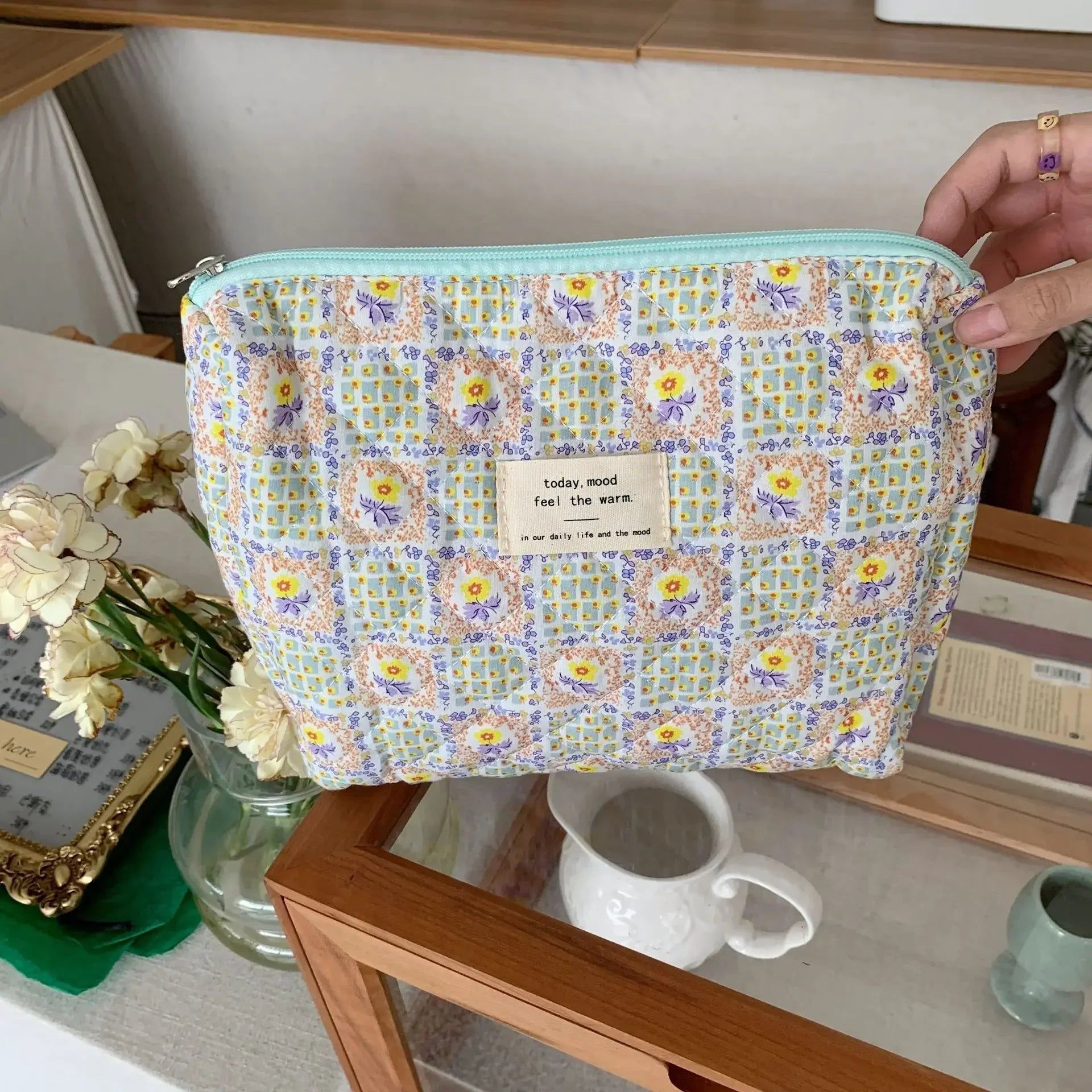 trousse de toilette matelassée avec motif floral