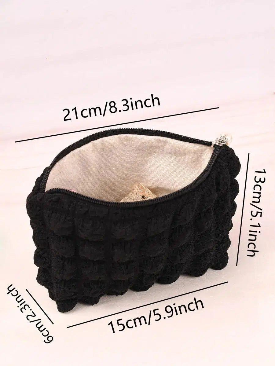 trousse de toilette femme matelassée noire