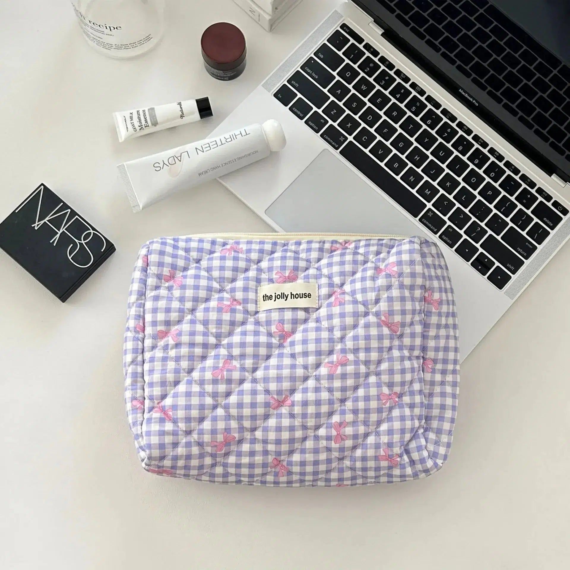 trousse de toilette matelassée couleur violet pour femme