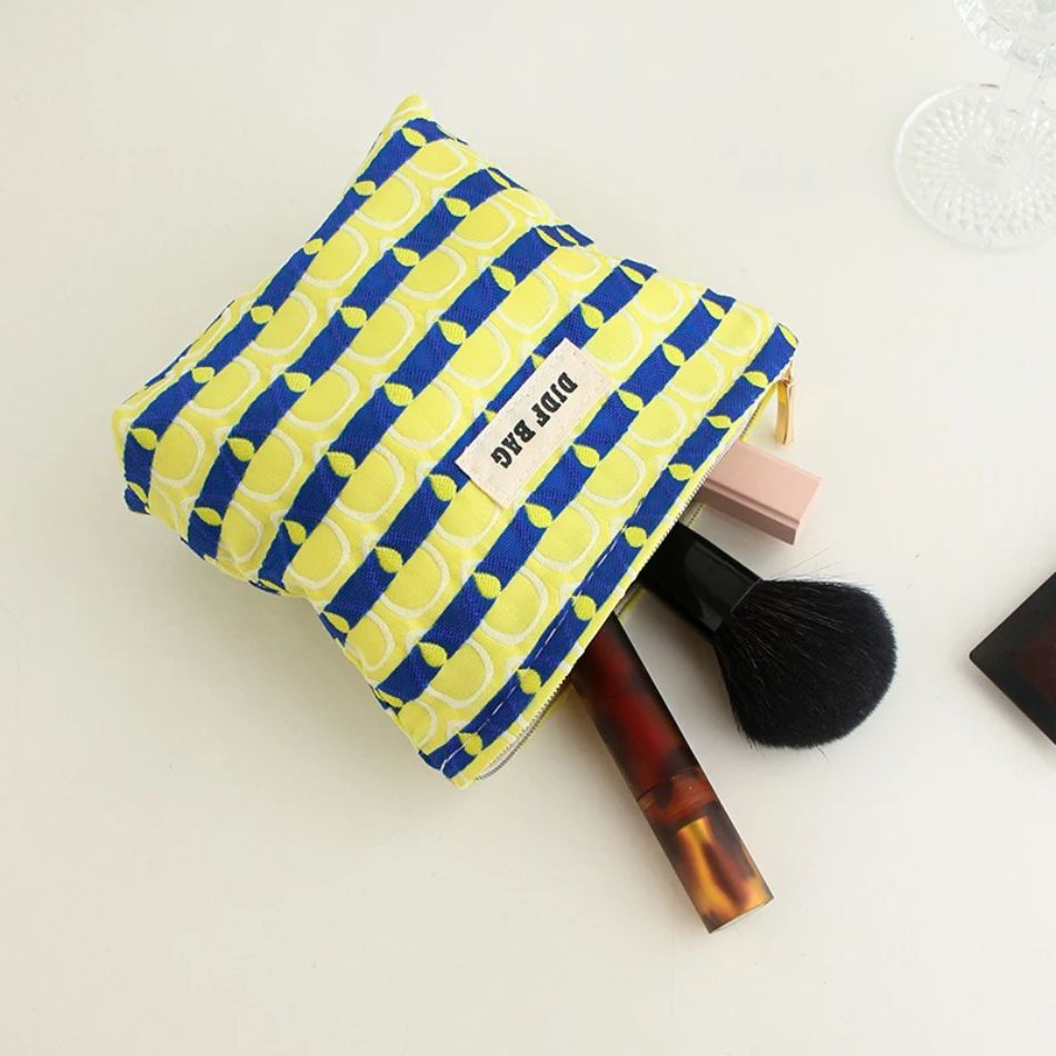 accessoire beauté motifs plumage paon