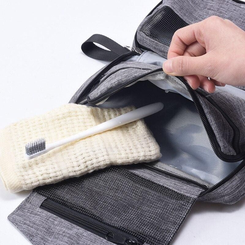 accessoire de voyage trousse grise