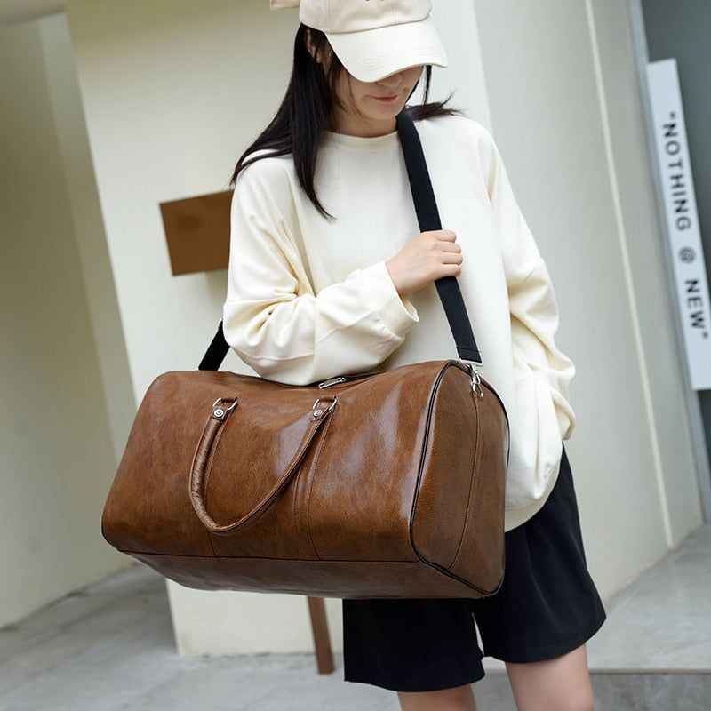 accessoire voyage en cuir pour femme