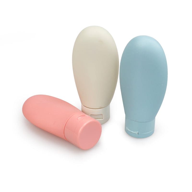 kit de douche avec trois flacons polyvalents