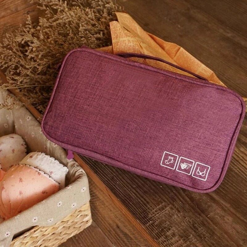 pochette violet pour accessoires de voyage