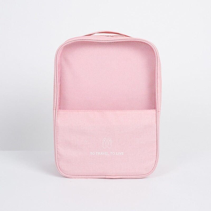 sac à chaussures de voyage rose avec compartiments séparés