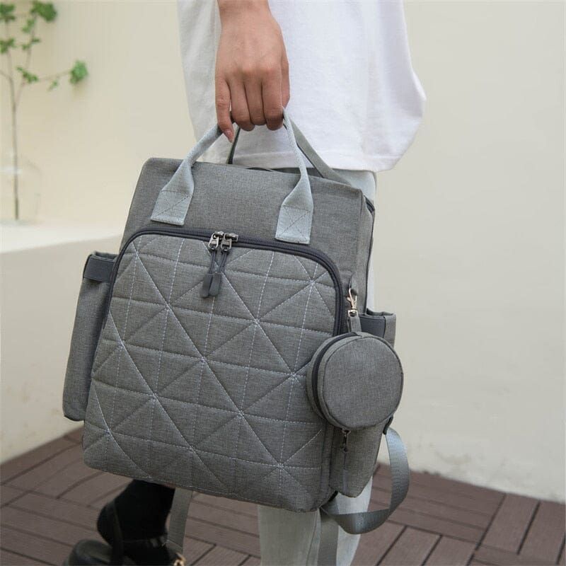sac à dos à langer en tissu résistant