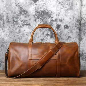 sac à main en cuir patiné avec poignée ajustable