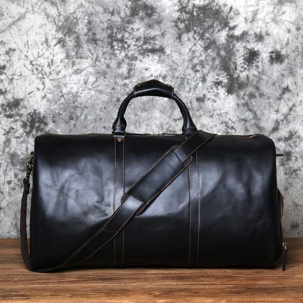 sac de voyage en cuir marron avec bandoulière réglable