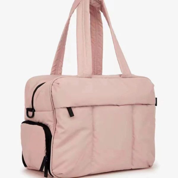 sac de voyage femme en tissu matelassé