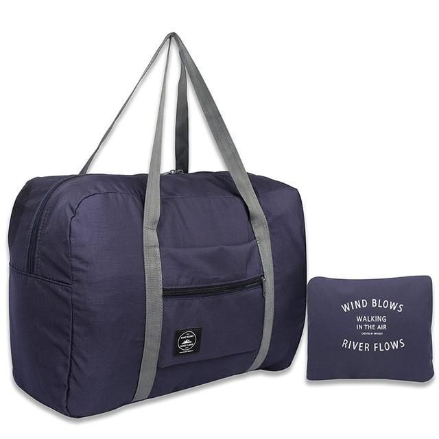 sac de voyage pliable bleu marine avec motif wind blow river flows
