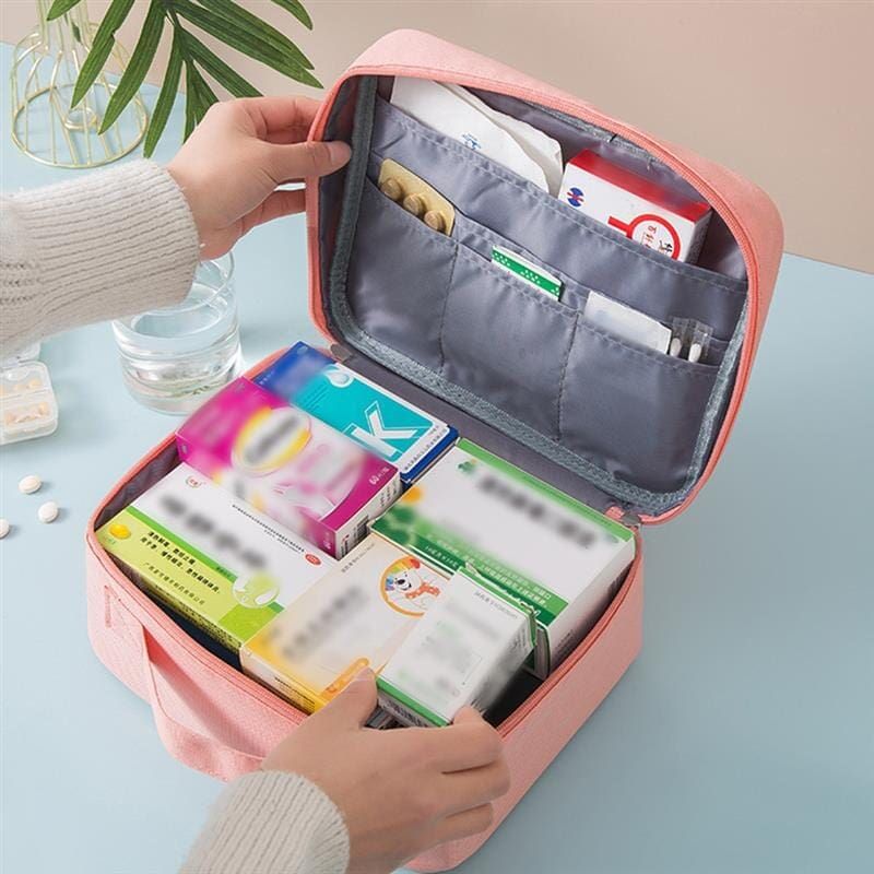 trousse de pharmacie rose pour voyage
