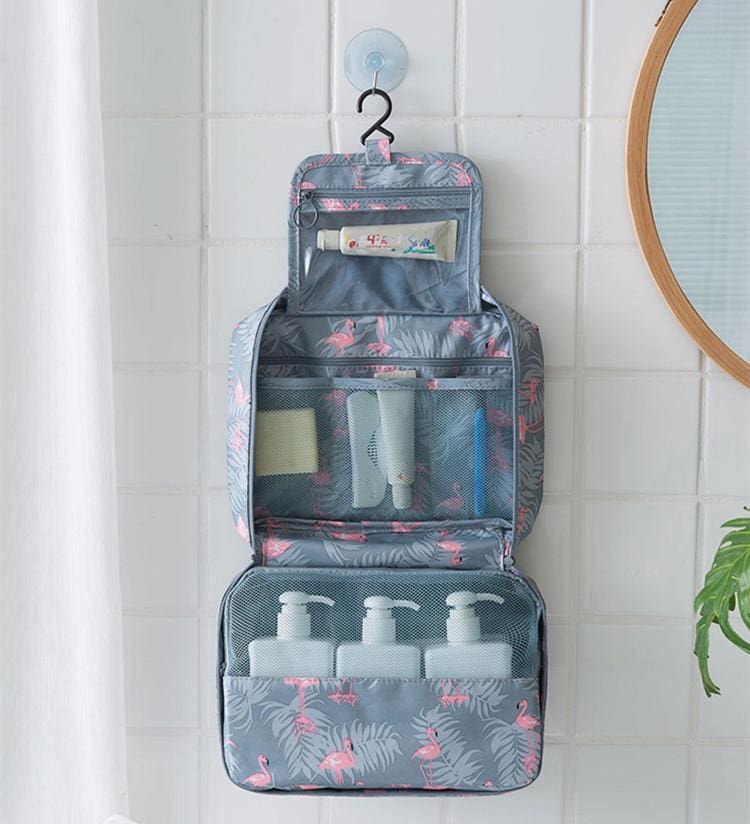 trousse de voyage motif flamant rose