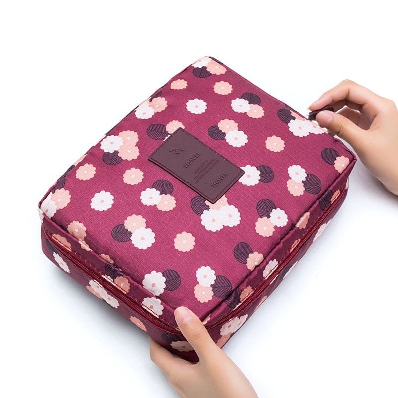 trousse de voyage pour maquillage avec motifs floraux